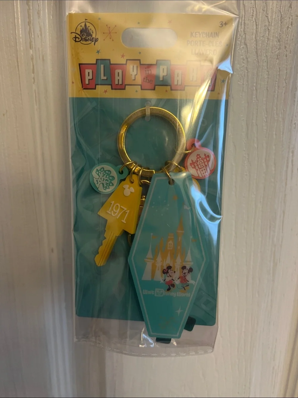 Disney Teal, Yellow & Pink Play the Park Kids Keychain with Castle Charm